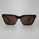 Harlem Brown Tort safety glasses with brown tinted lenses, front view on a light grey background